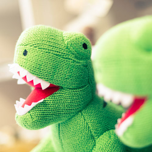 Knitted green dinosaur